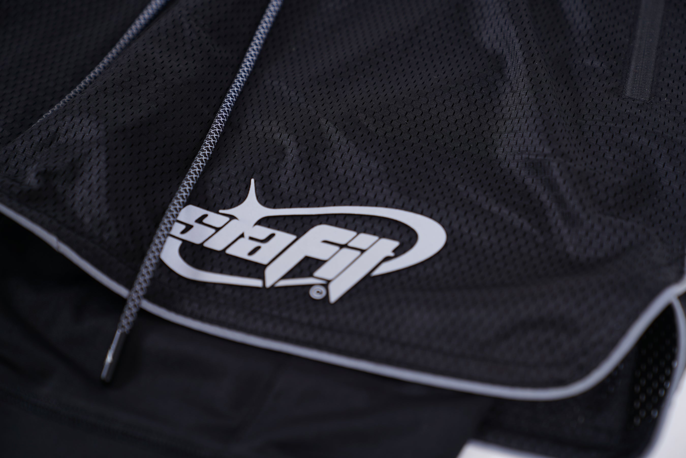 SIA FIT “BLACK/REFLECTIVE MESH WORKOUT SHORTS