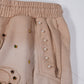 STAR-STUDDED SHORTS (TAN)
