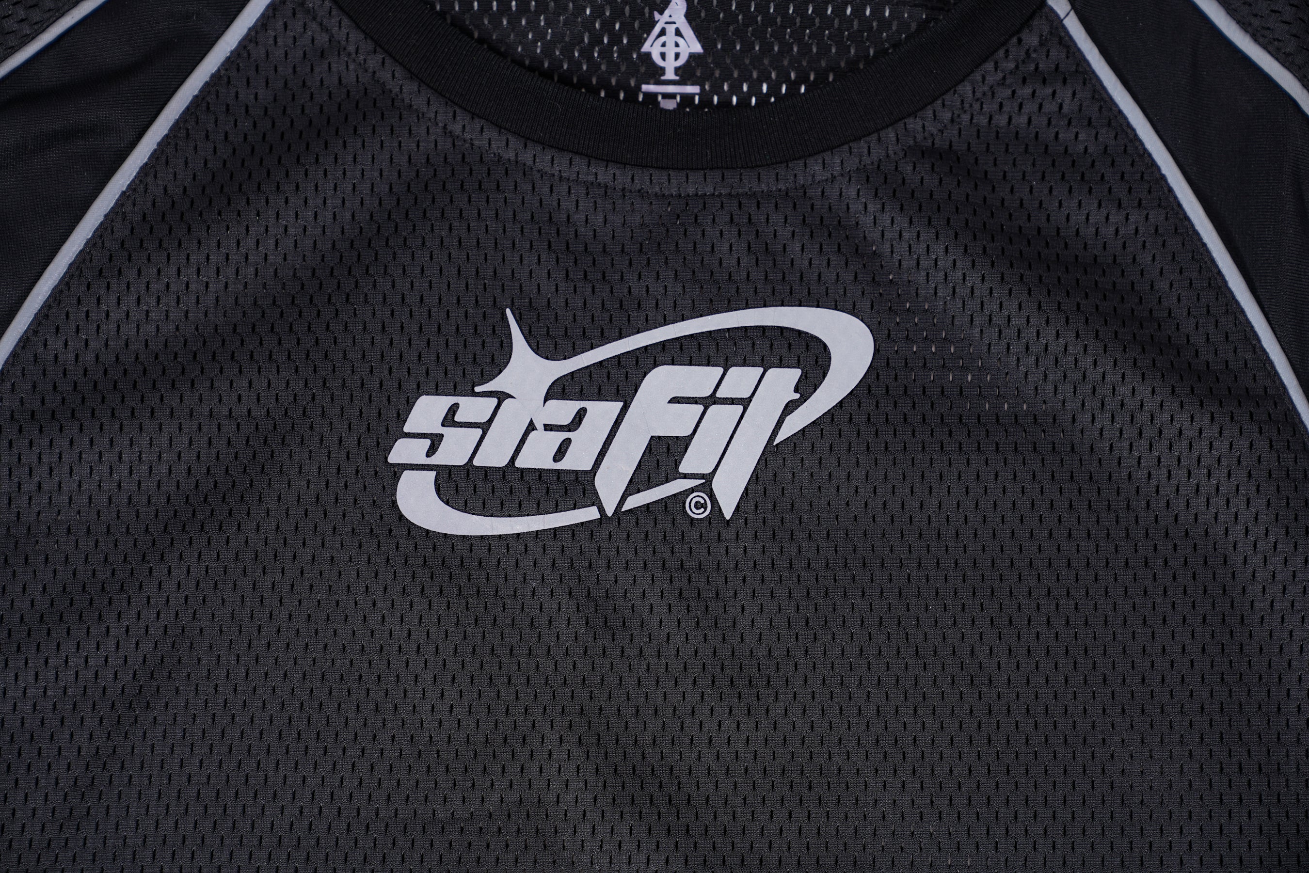 SIA-FIT “BLACK/REFLECTIVE MESH WORKOUT SHRIT