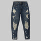 SIA HER DISTRESSED BOYFRIEND JEANS