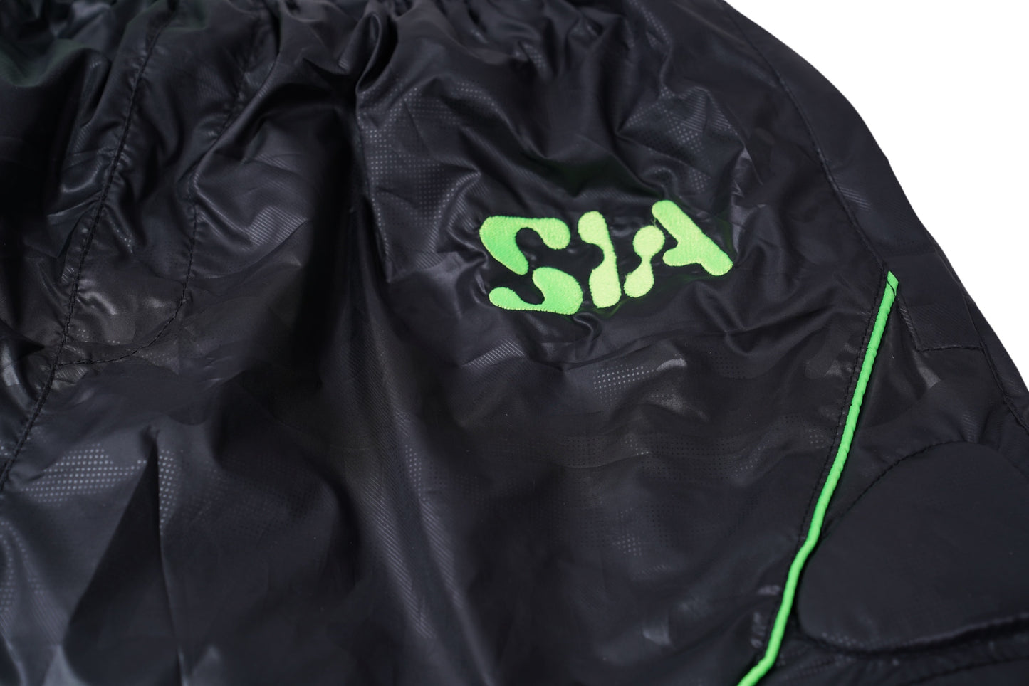 PADDED WINDBREAKER SHORTS (BLACK/VOLT)