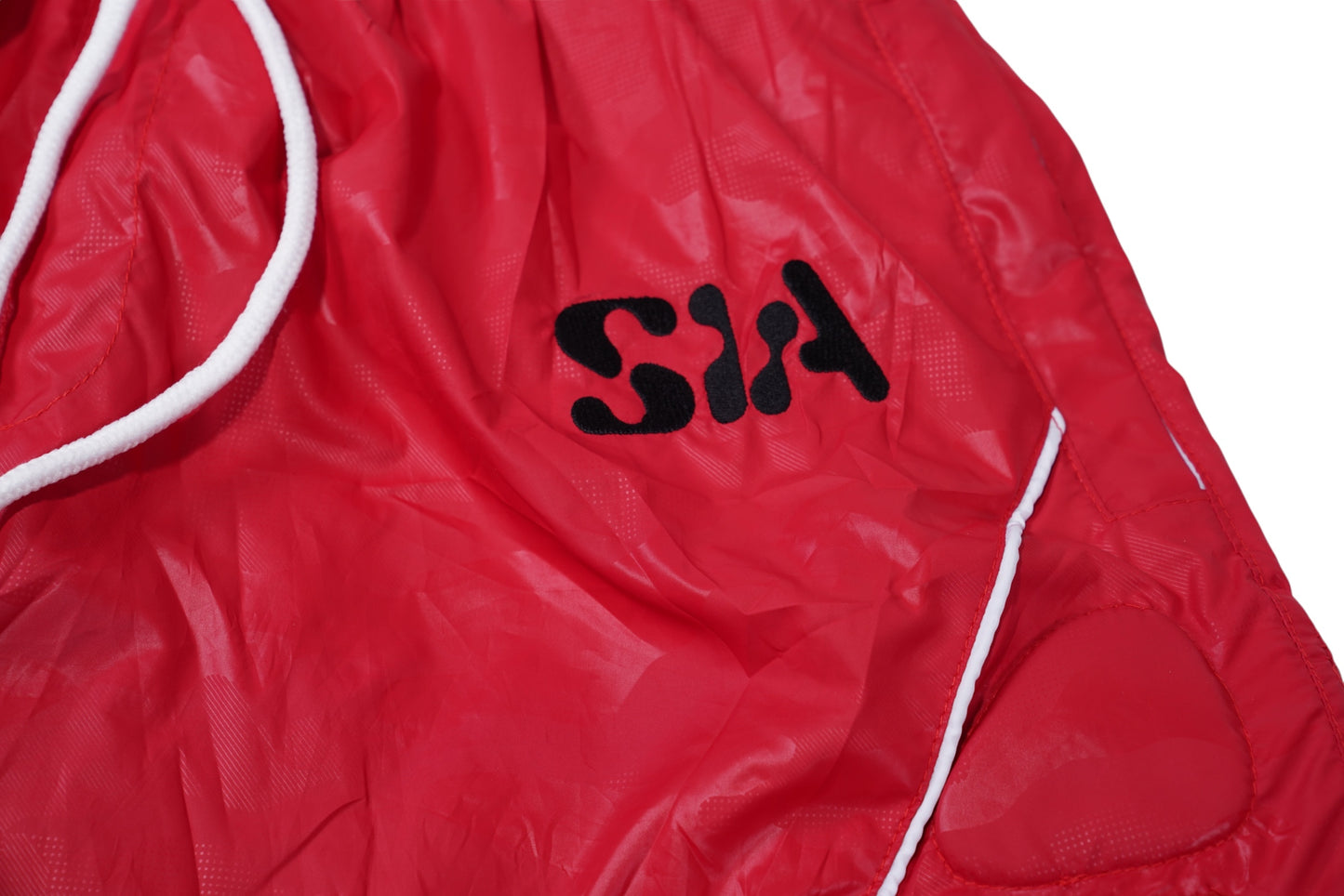 PADDED WINDBREAKER SHORTS (RED)
