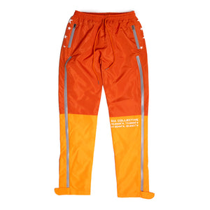 
                  
                    Load image into Gallery viewer, SIA &amp;quot;SOLAR ORANGE&amp;quot; SIDE ZIP PANTS
                  
                