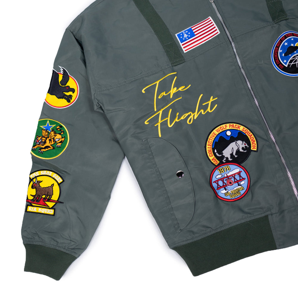 
                  
                    Load image into Gallery viewer, SIA &amp;quot;TAKE FLIGHT&amp;quot; OLIVE BOMBER
                  
                